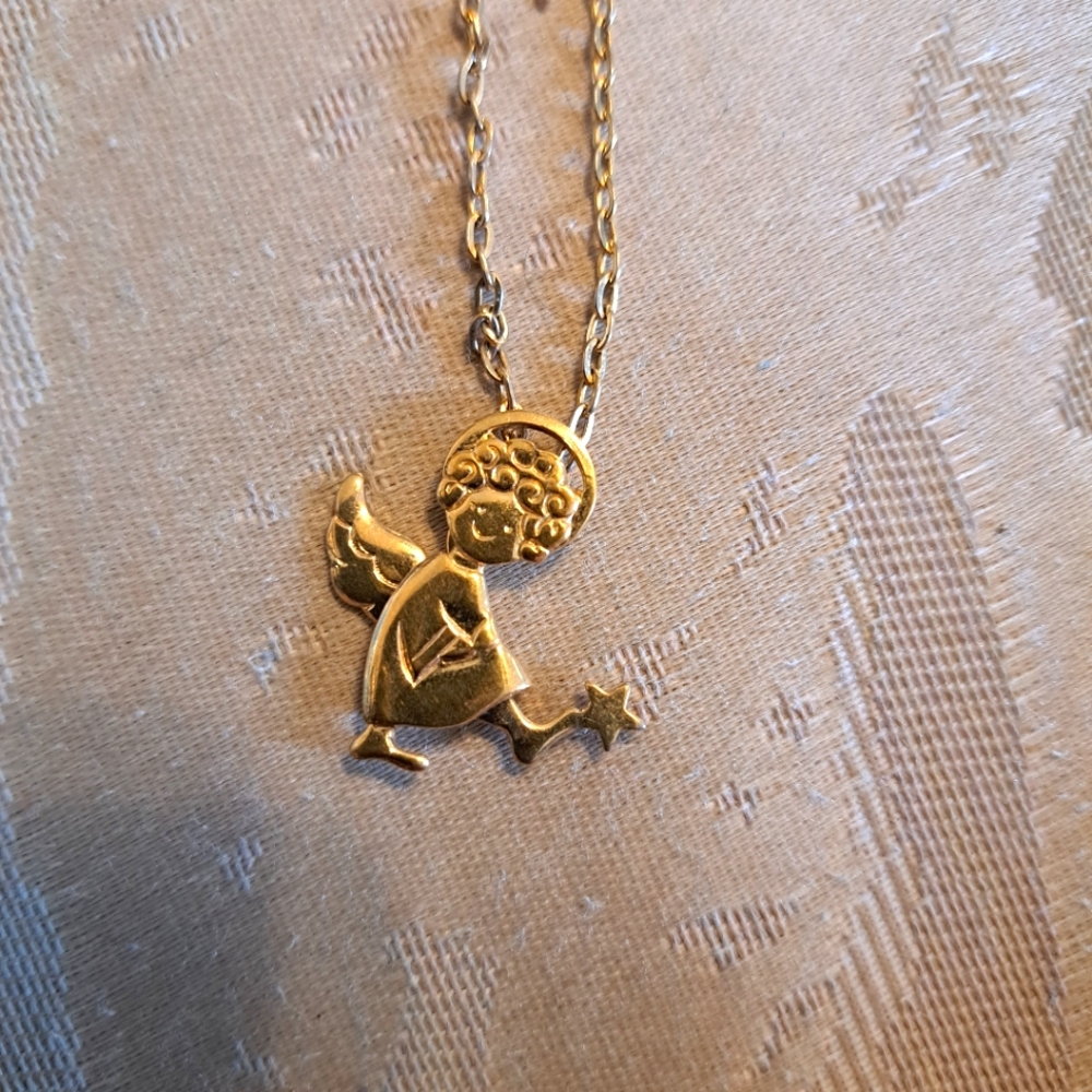Avon angel necklace